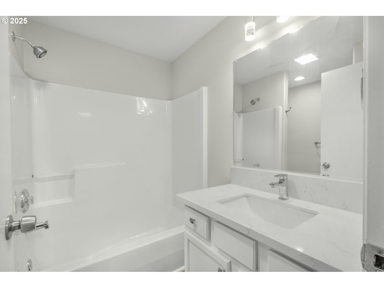 1244 Southwest 160th Avenue, Unit 104 Beaverton, OR 97006 - Photo 25 of 31 a bathroom with a sink and a mirror