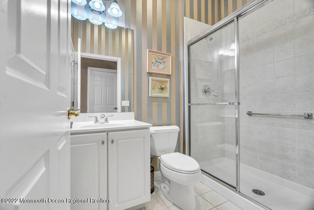 48 Winged Foot Road Jackson, NJ 08527 - Photo 44 of 69 a bathroom with a sink a toilet and shower