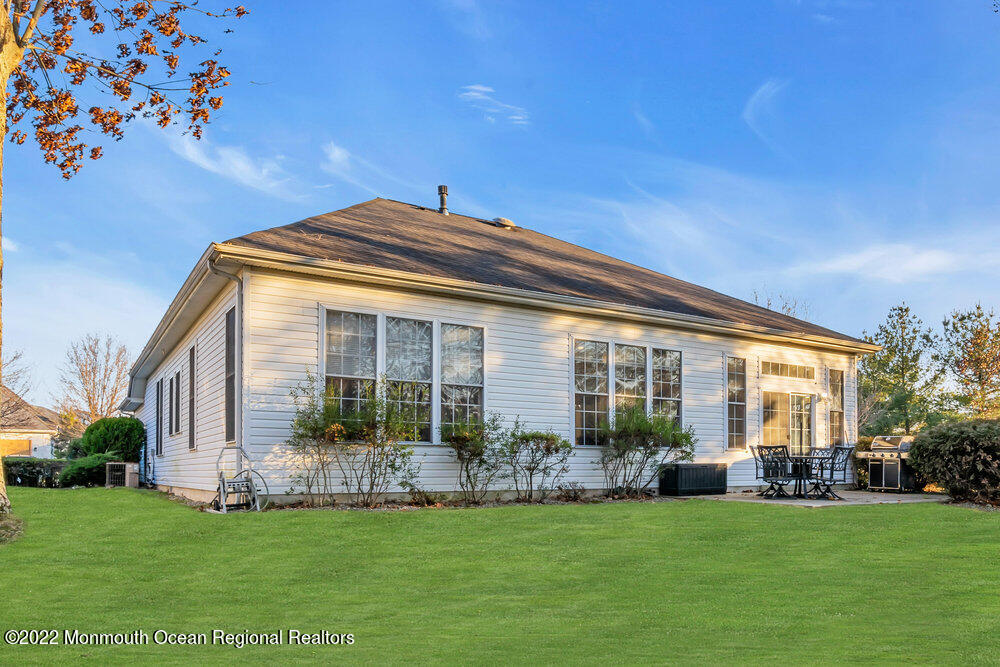 48 Winged Foot Road Jackson, NJ 08527 - Photo 51 of 69 a front view of a house with a garden