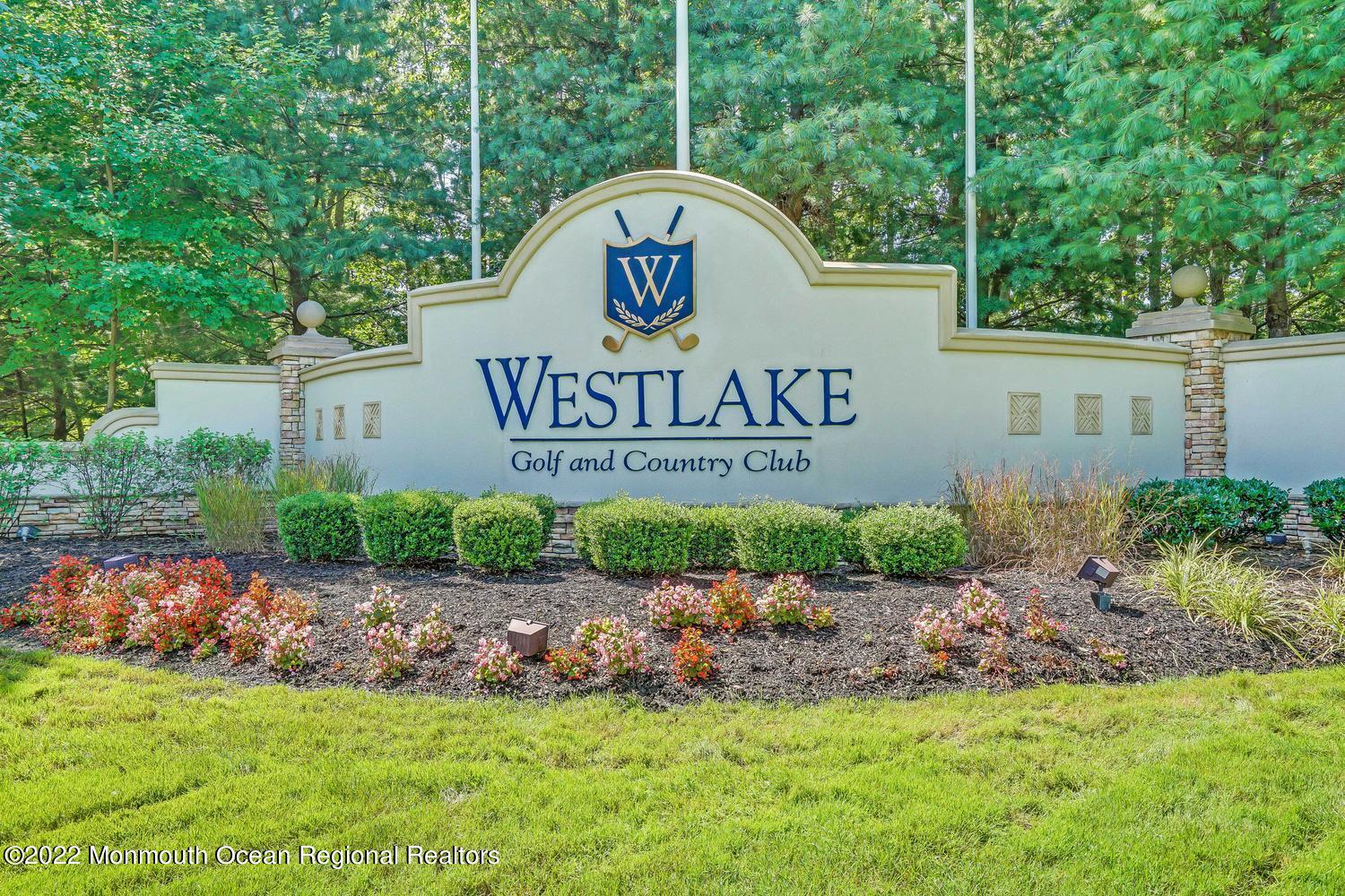 48 Winged Foot Road Jackson, NJ 08527 - Photo 56 of 69 a sign on the side of the road