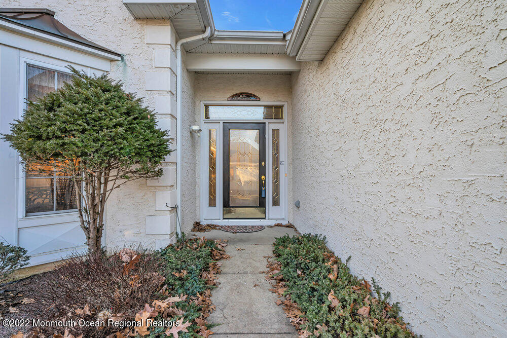 48 Winged Foot Road Jackson, NJ 08527 - Photo 8 of 69 a front view of a house with a yard