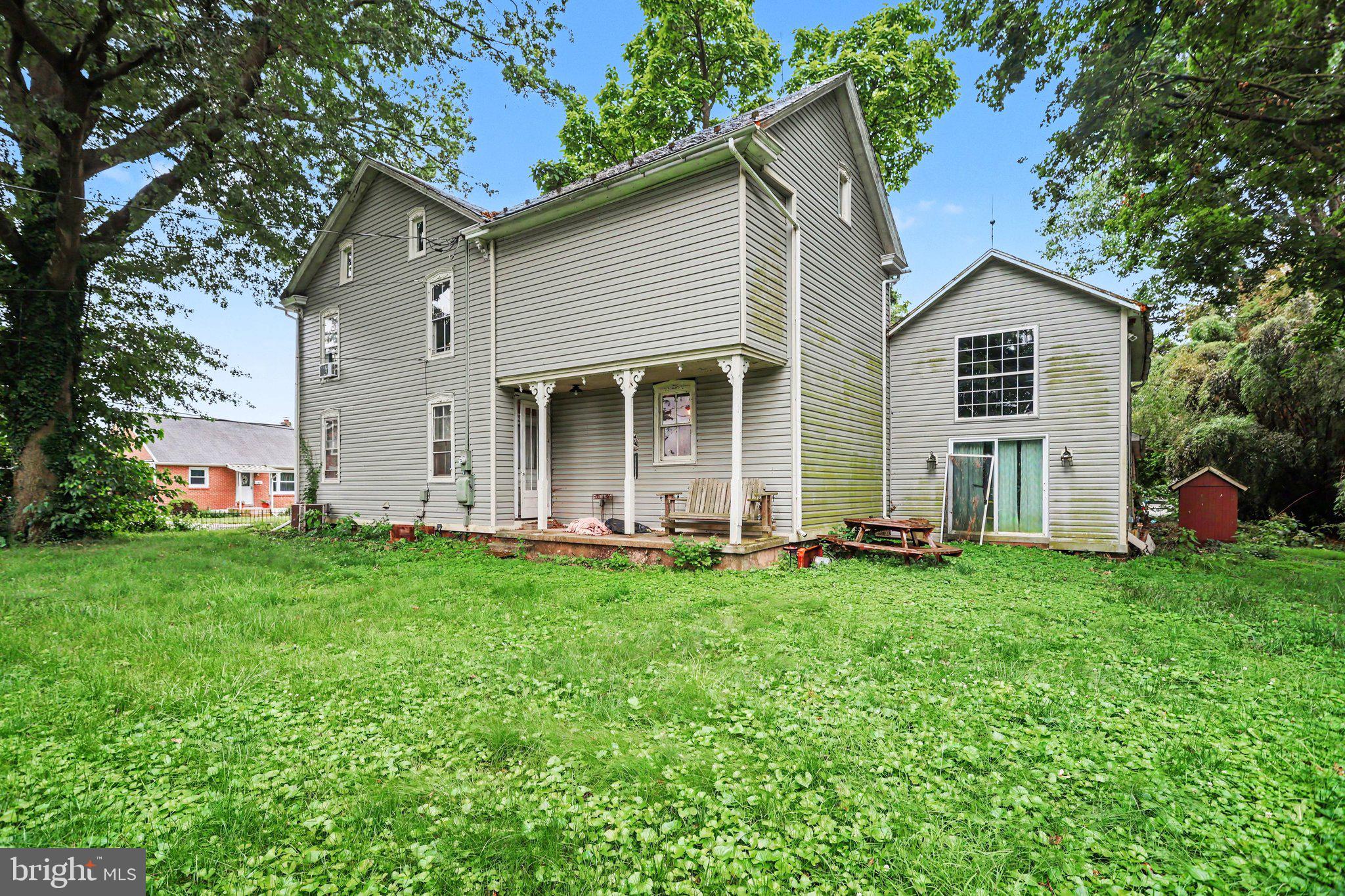 61 Mayfield Street Dover, PA 17315 - Photo 5 of 26 Charming home with lush green surroundings.