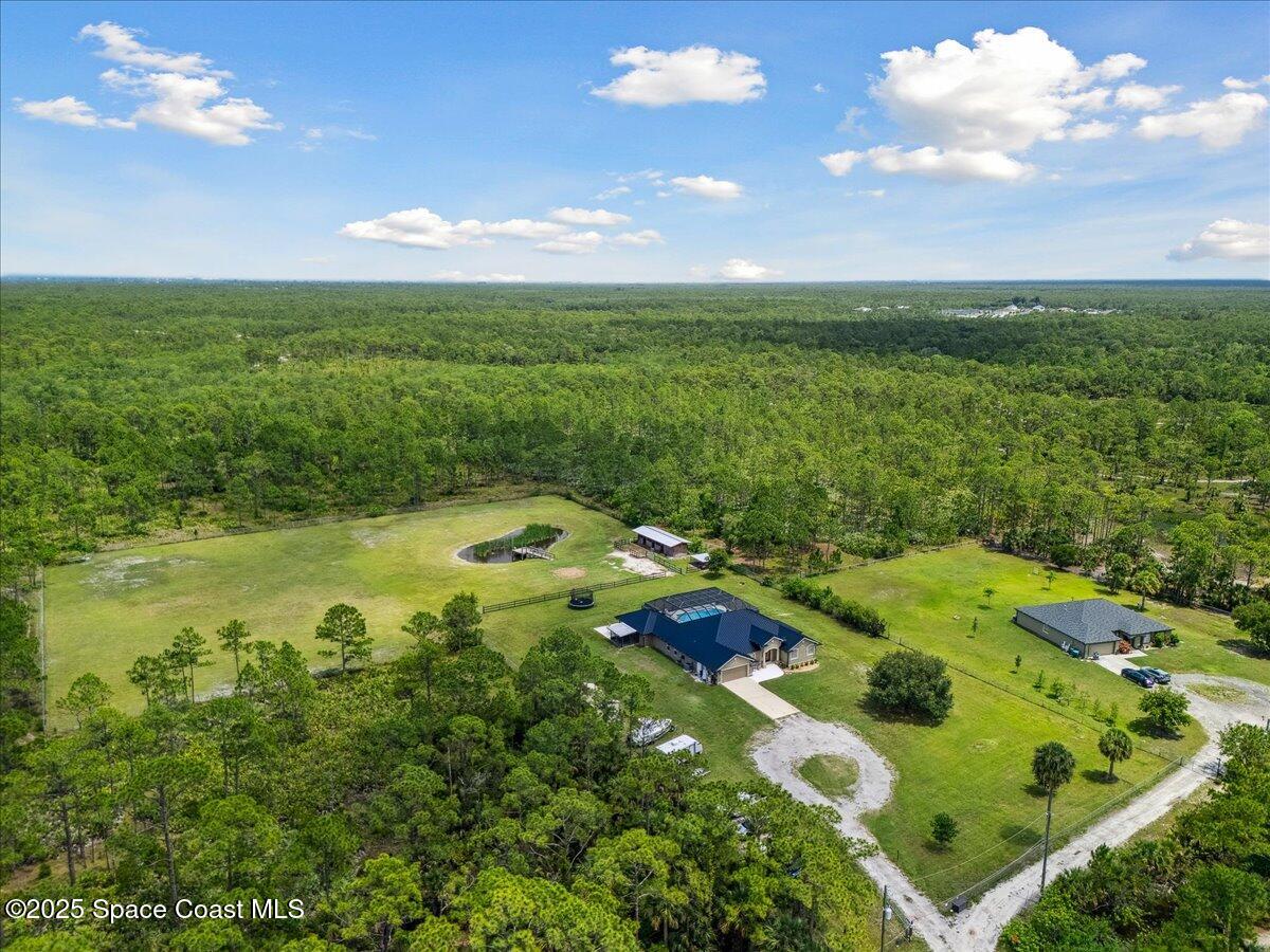 5005 Corey Road Grant Valkaria, FL 32950 - Photo 41 of 47 a view of a lake with outdoor space