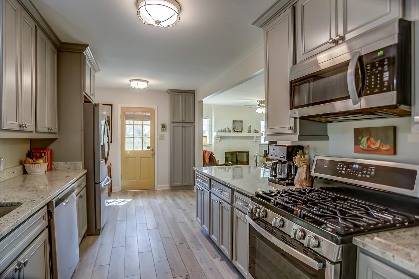 4697 Sequoia Road Memphis, TN 38117 - Photo 11 of 15 a kitchen with stainless steel appliances granite countertop a stove and a sink