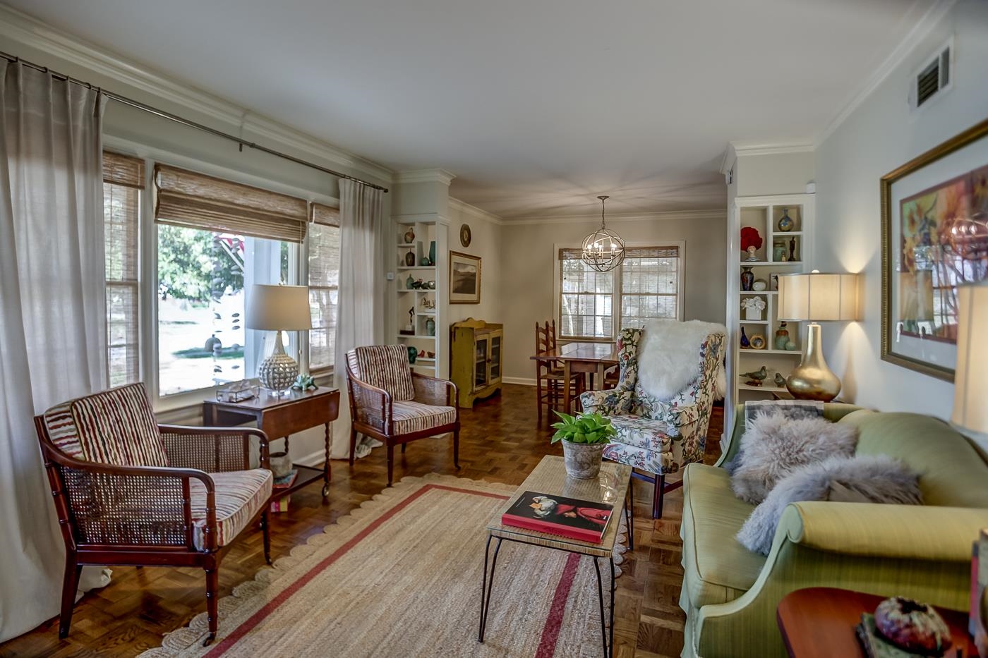4697 Sequoia Road Memphis, TN 38117 - Photo 2 of 15 a living room with furniture and a wooden floor