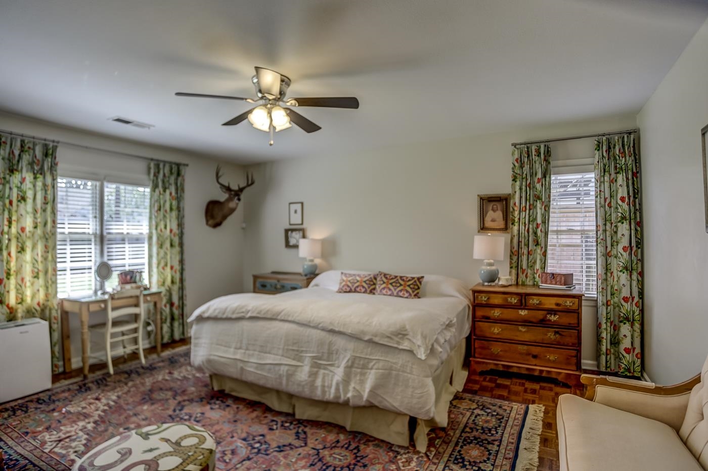 4697 Sequoia Road Memphis, TN 38117 - Photo 5 of 15 a bedroom with a bed and wooden floor
