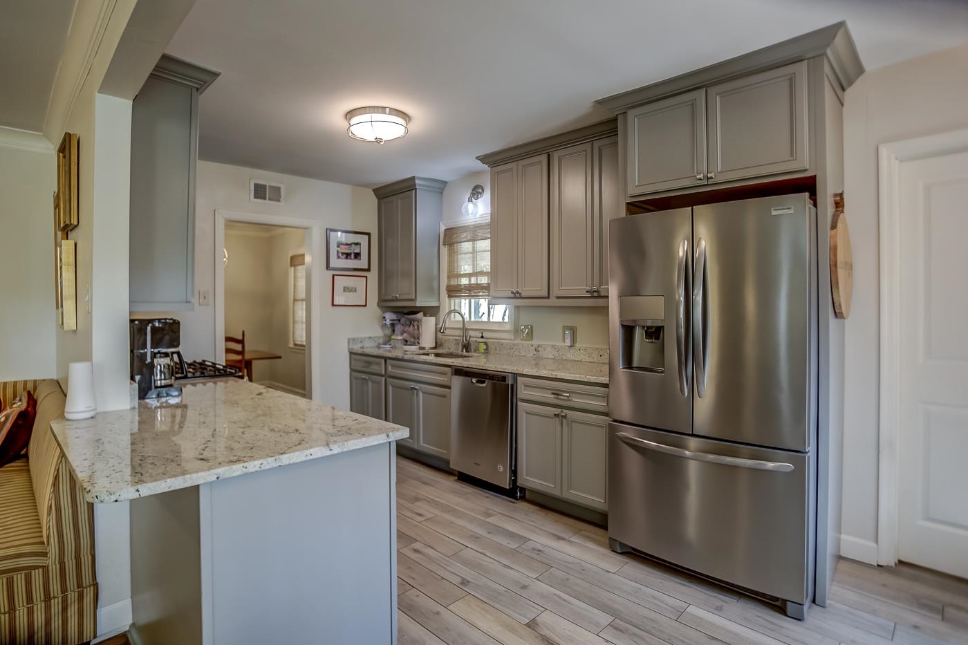 4697 Sequoia Road Memphis, TN 38117 - Photo 10 of 15 a kitchen with stainless steel appliances granite countertop a refrigerator stove microwave and sink