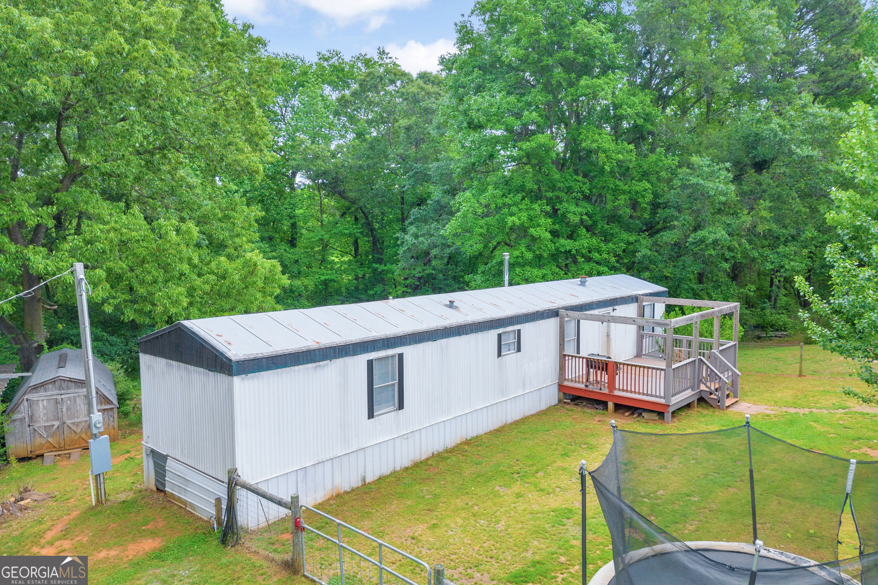 631 Poole Road Homer, GA 30547 - Photo 1 of 1 a view of a house with a backyard