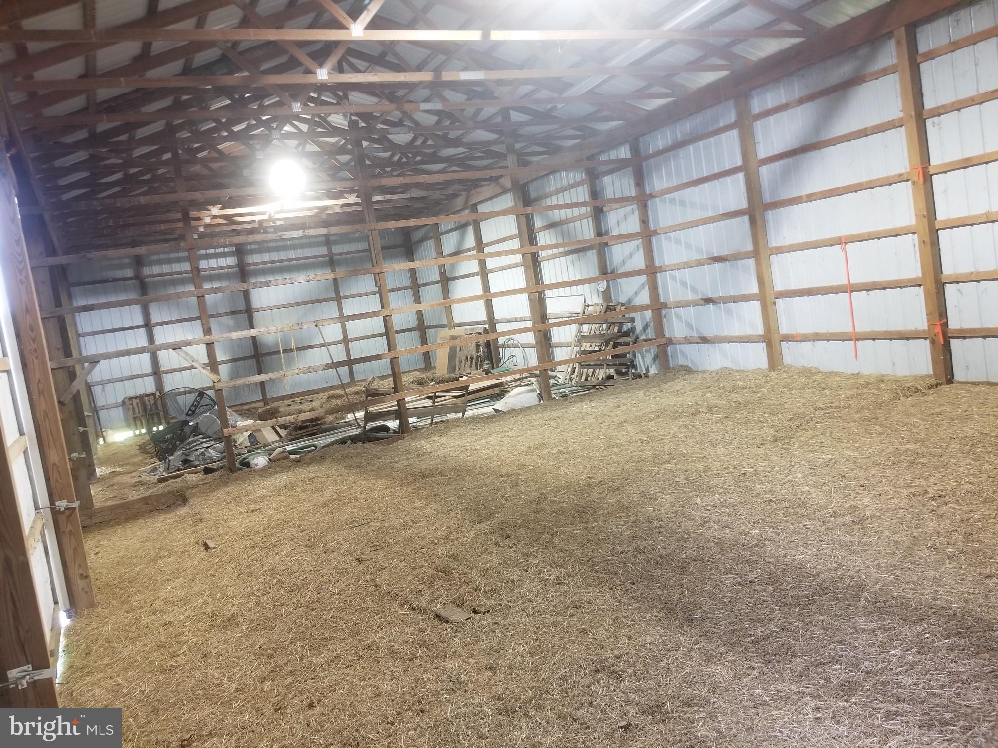 4938 Halltown Road Hartly, DE 19953 - Photo 16 of 32 interior of 30'x120' barn, has 3 sections