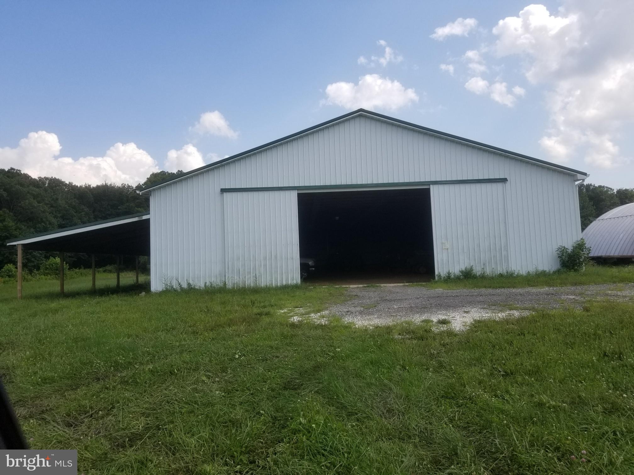 4938 Halltown Road Hartly, DE 19953 - Photo 24 of 32 large sliding doors on 100'x50' pole barn