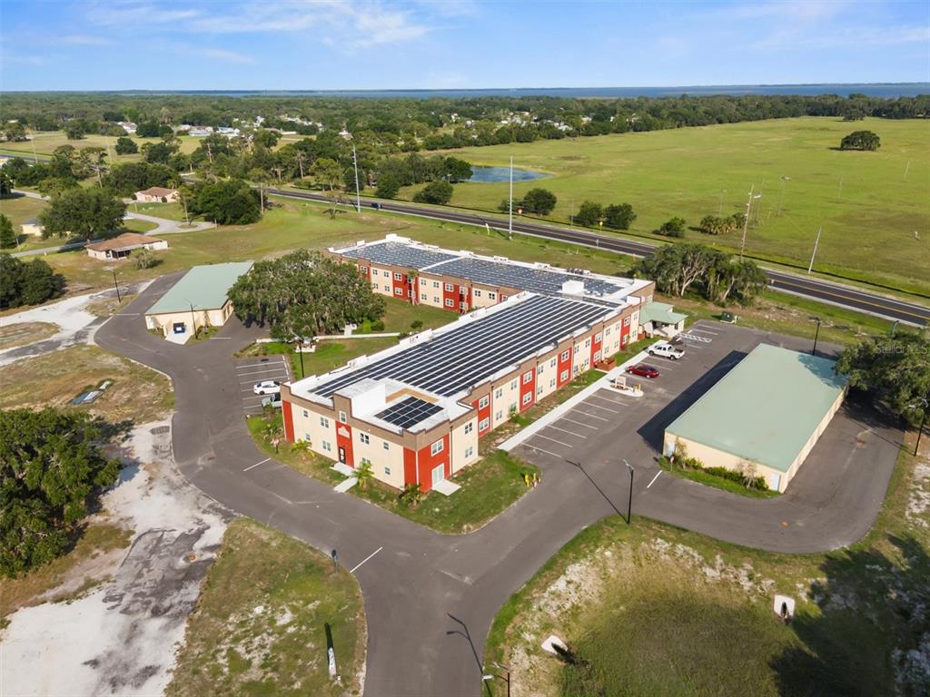 260 Spanish Moss Circle, Unit 101 Sebring, FL 33876 - Photo 15 of 35 an aerial view of a house with a ocean view