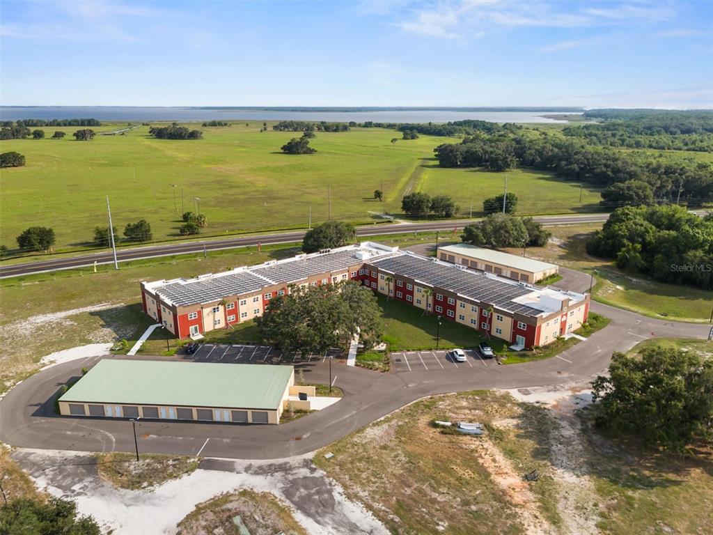 260 Spanish Moss Circle, Unit 101 Sebring, FL 33876 - Photo 21 of 35 a view of a city with an ocean view