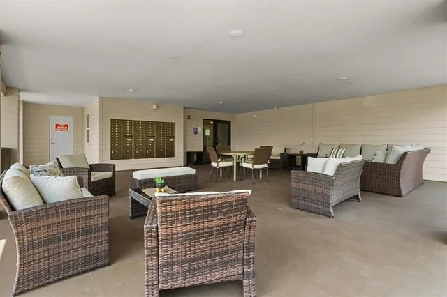 a living room with furniture and a couch