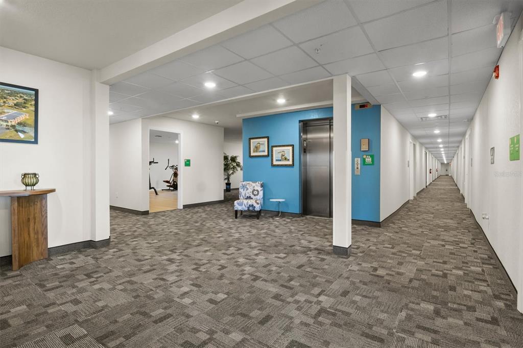 260 Spanish Moss Circle, Unit 101 Sebring, FL 33876 - Photo 24 of 35 a view of a hallway with closet