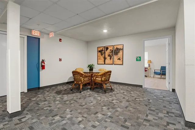a room with furniture and a wooden floor