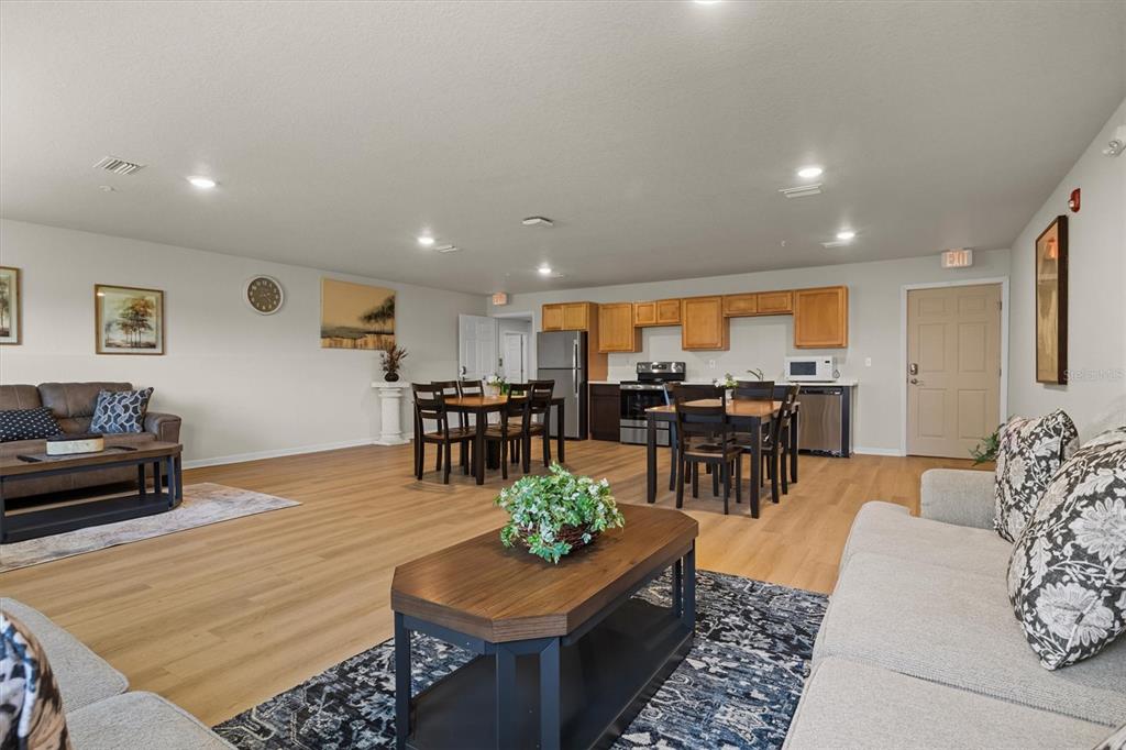 260 Spanish Moss Circle, Unit 101 Sebring, FL 33876 - Photo 35 of 35 a living room with furniture and a table
