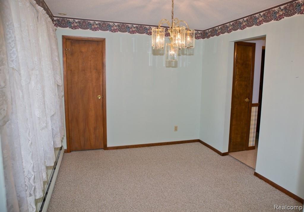 4890 East Dunbar Road Monroe, MI 48161 - Photo 6 of 18 Dunbar 4890 E Dining Room.jpg