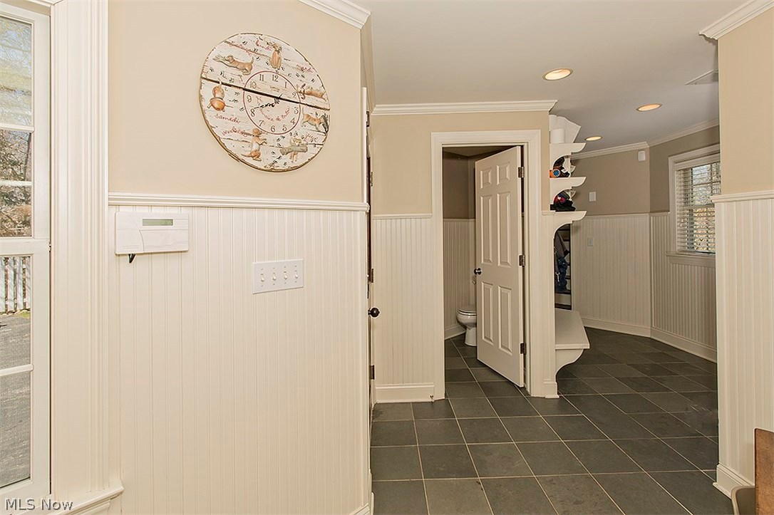 33325 Woodleigh Road Cleveland, OH 44124 - Photo 28 of 35 There is a spacious mudroom with all the beauty and function that one would expect. A 2nd half bath is located off the mudroom.