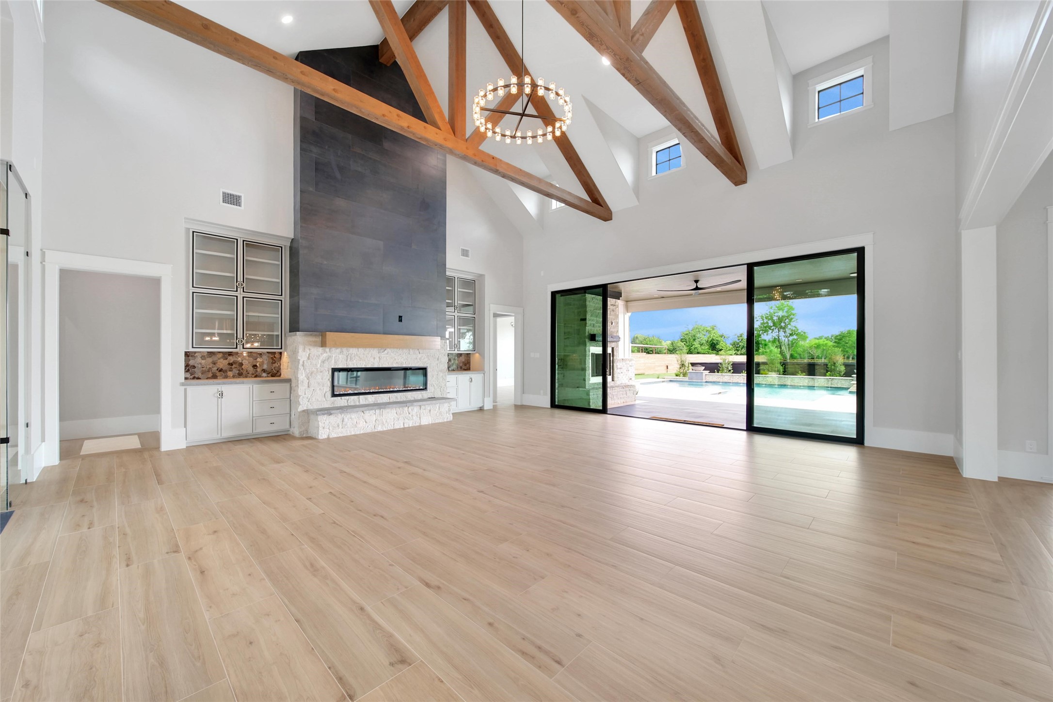 18829 Cypress Church Road Cypress, TX 77433 - Photo 11 of 50 a view of an empty room with a fireplace and a window