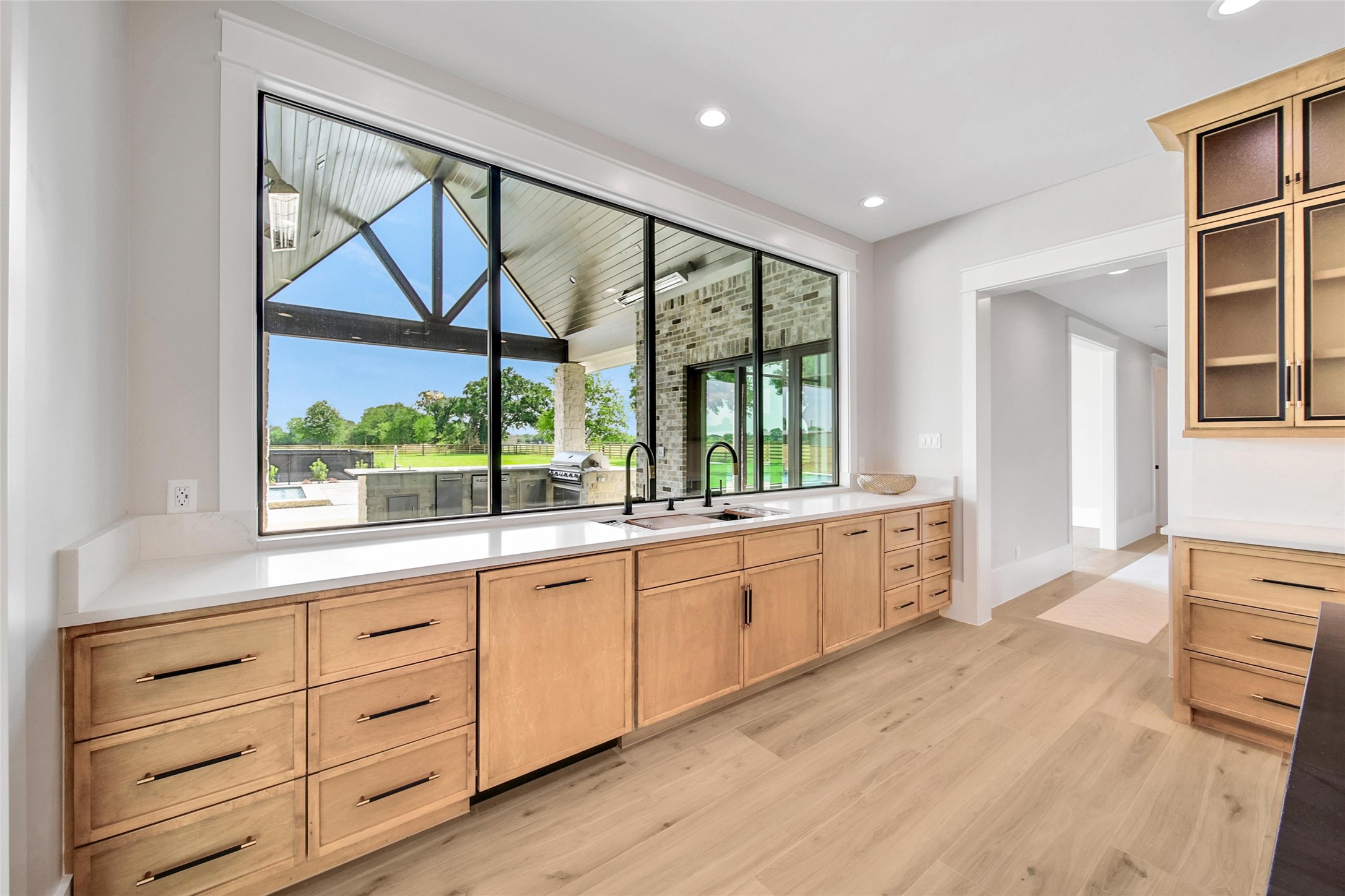 18829 Cypress Church Road Cypress, TX 77433 - Photo 18 of 50 a large kitchen with a window
