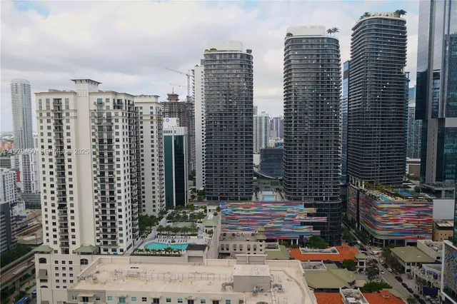 a view of a city with tall buildings