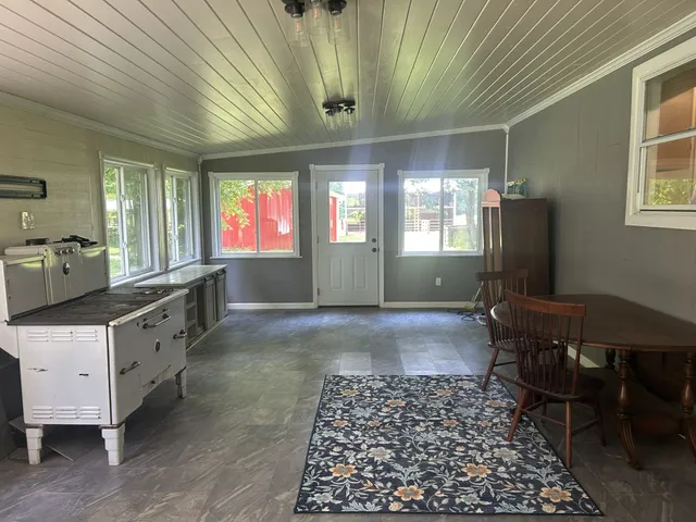 a room with furniture and window