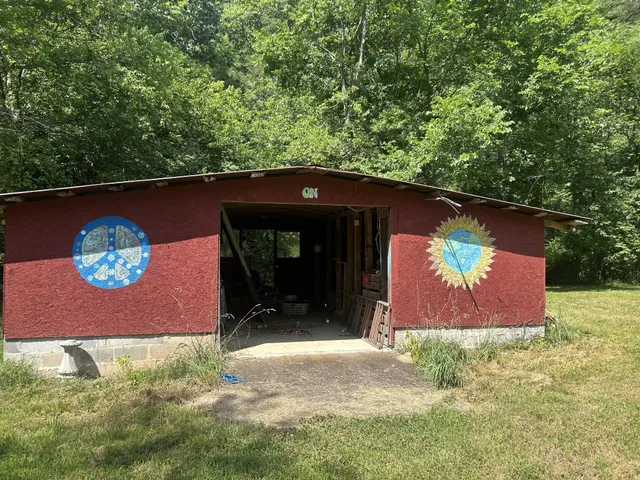 a front view of a house with yard