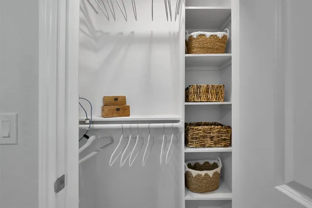 a bathroom with a sink and a window