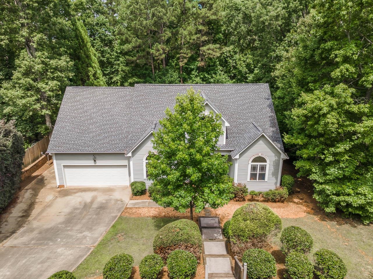 1309 Taylor Farm Road Raleigh, NC 27603 - Photo 32 of 38 Mature landscaping in the front from street. Steps down from the street. Land/Lot