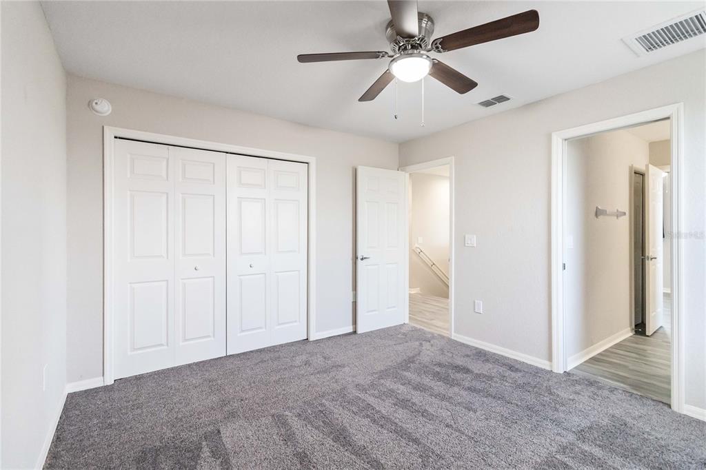 3723 Ricky Lane St. Cloud, FL 34772 - Photo 26 of 36 a view of a big room with a chandelier fan