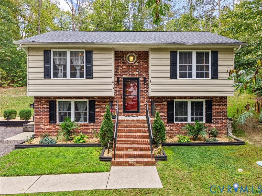 26315 Hill Road Ruther Glen, VA 22546 - Photo 1 of 47 Raised ranch featuring brick siding and a front la