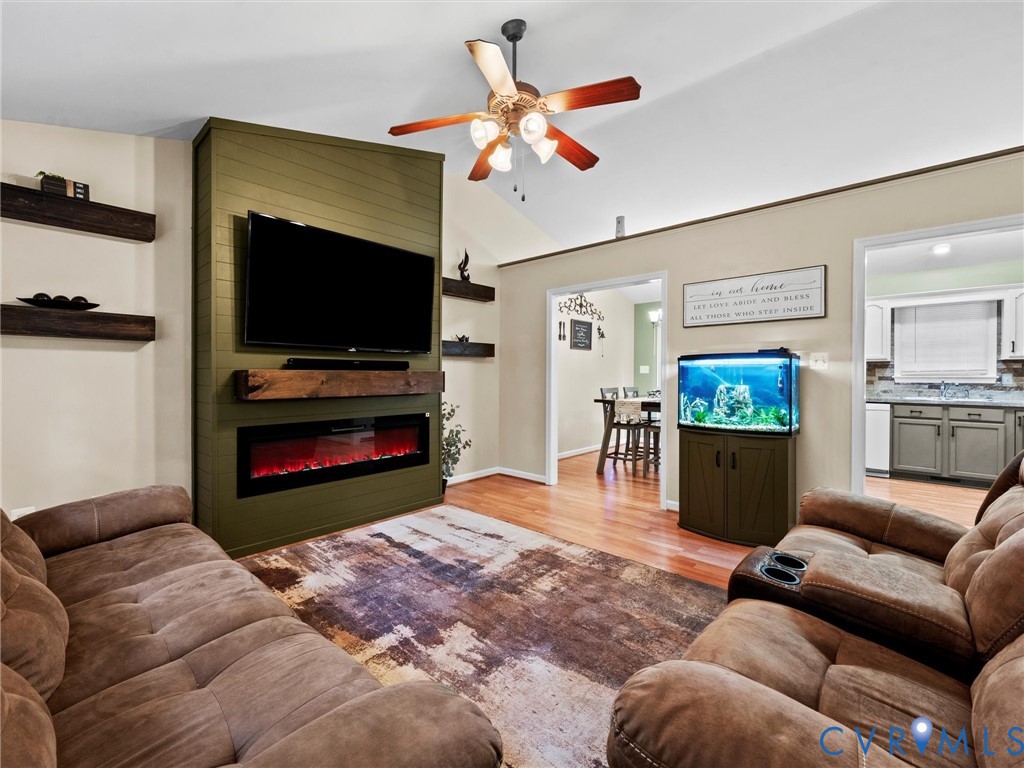 26315 Hill Road Ruther Glen, VA 22546 - Photo 11 of 47 Living room featuring light wood-type flooring, a