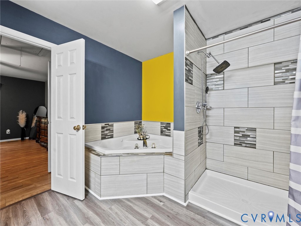 26315 Hill Road Ruther Glen, VA 22546 - Photo 28 of 47 Bathroom featuring a shower stall, a garden tub, a