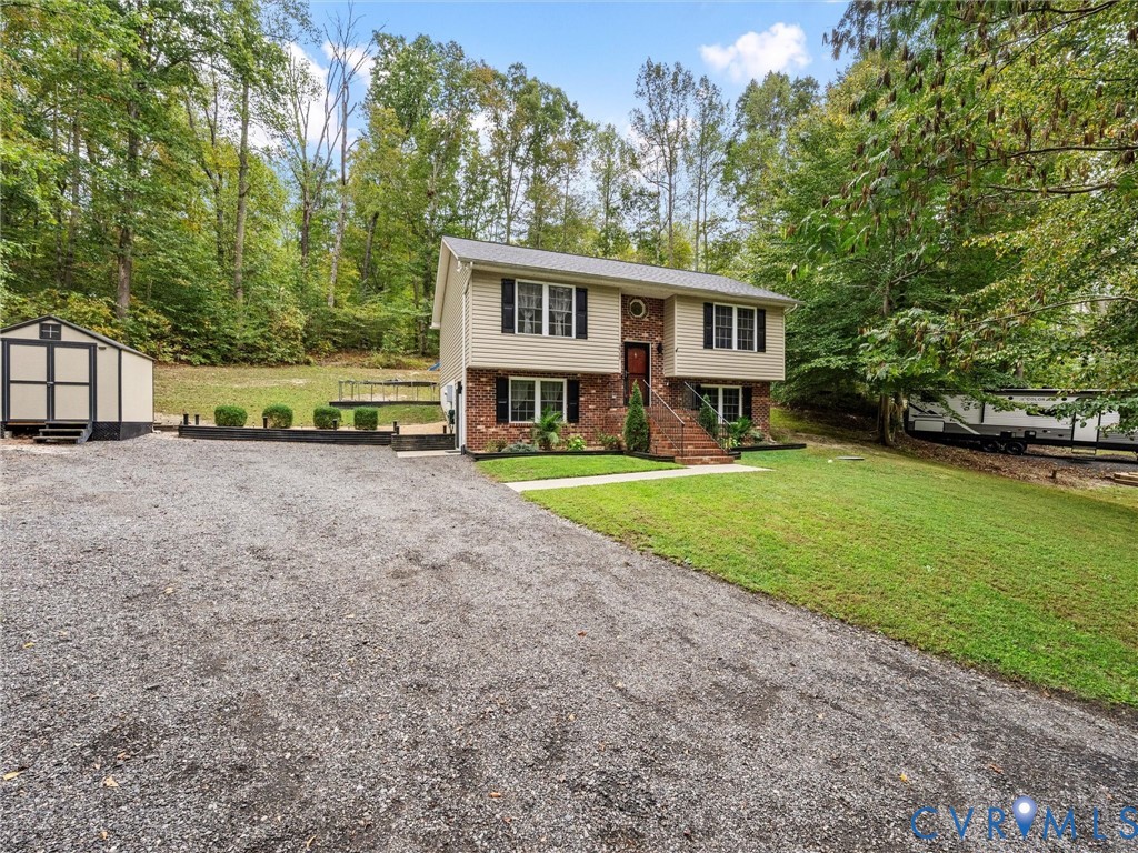 26315 Hill Road Ruther Glen, VA 22546 - Photo 6 of 47 Split foyer home featuring brick siding, a front l
