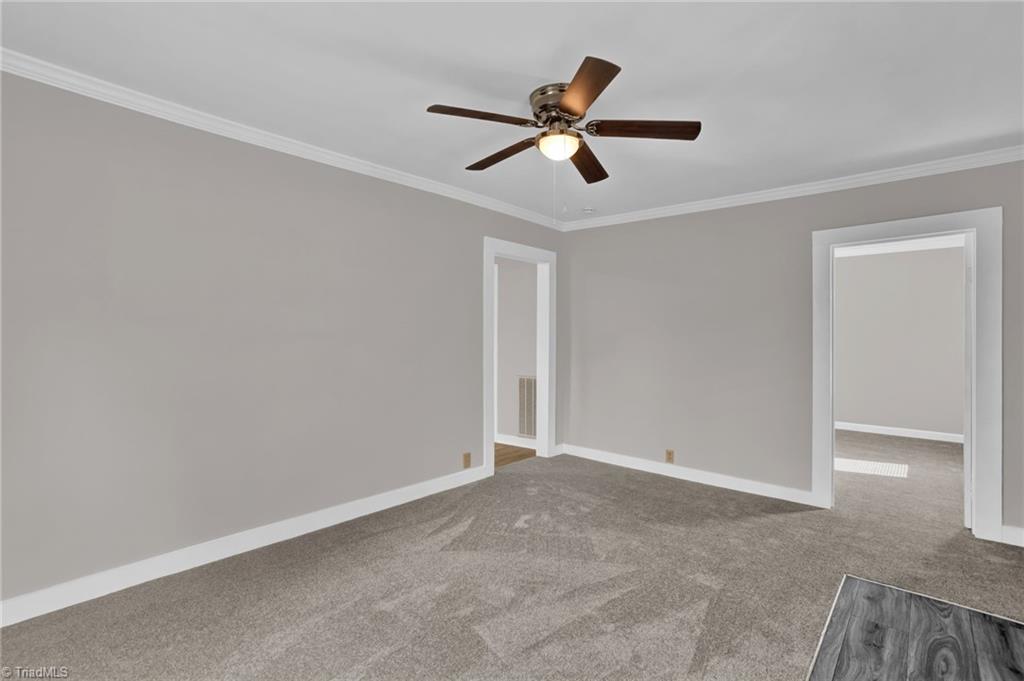 373 Boaze Road Lexington, NC 27295 - Photo 7 of 33 Living room facing primary bedroom and kitchen
