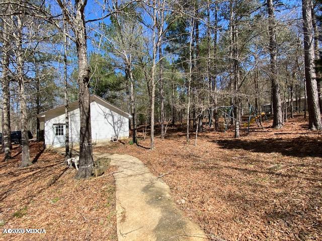 4999 Sandy Run Road Sparta, GA 31087 - Photo 2 of 19 a view of road and trees