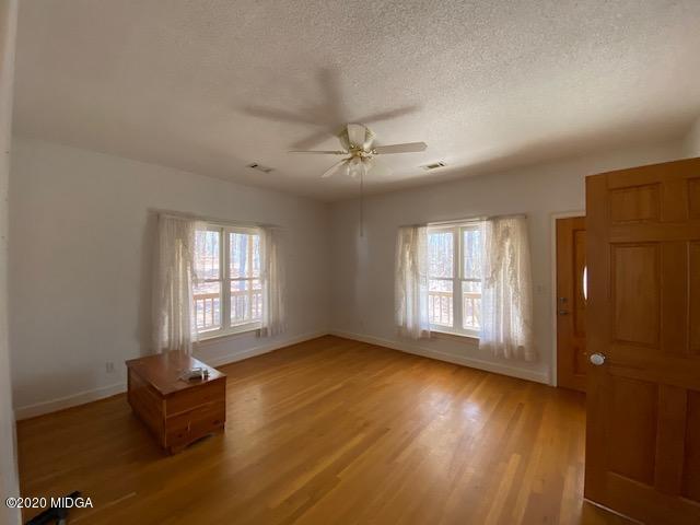 4999 Sandy Run Road Sparta, GA 31087 - Photo 11 of 19 a living room with furniture and a window