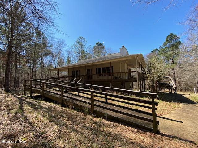 4999 Sandy Run Road Sparta, GA 31087 - Photo 6 of 19 a view of a house with a yard