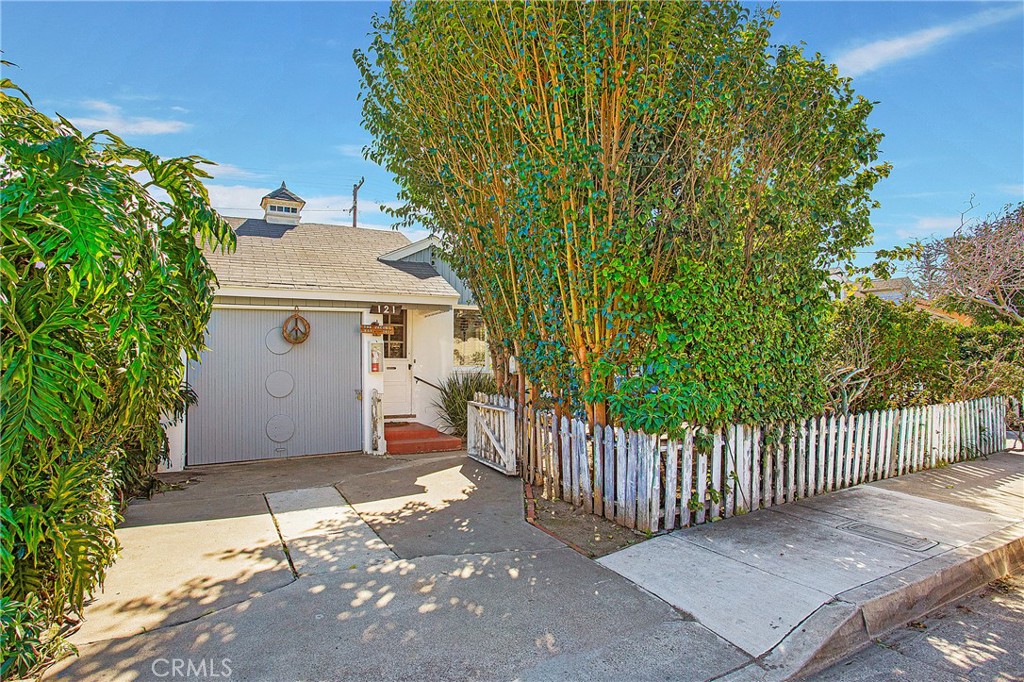 a front view of a house with a garage