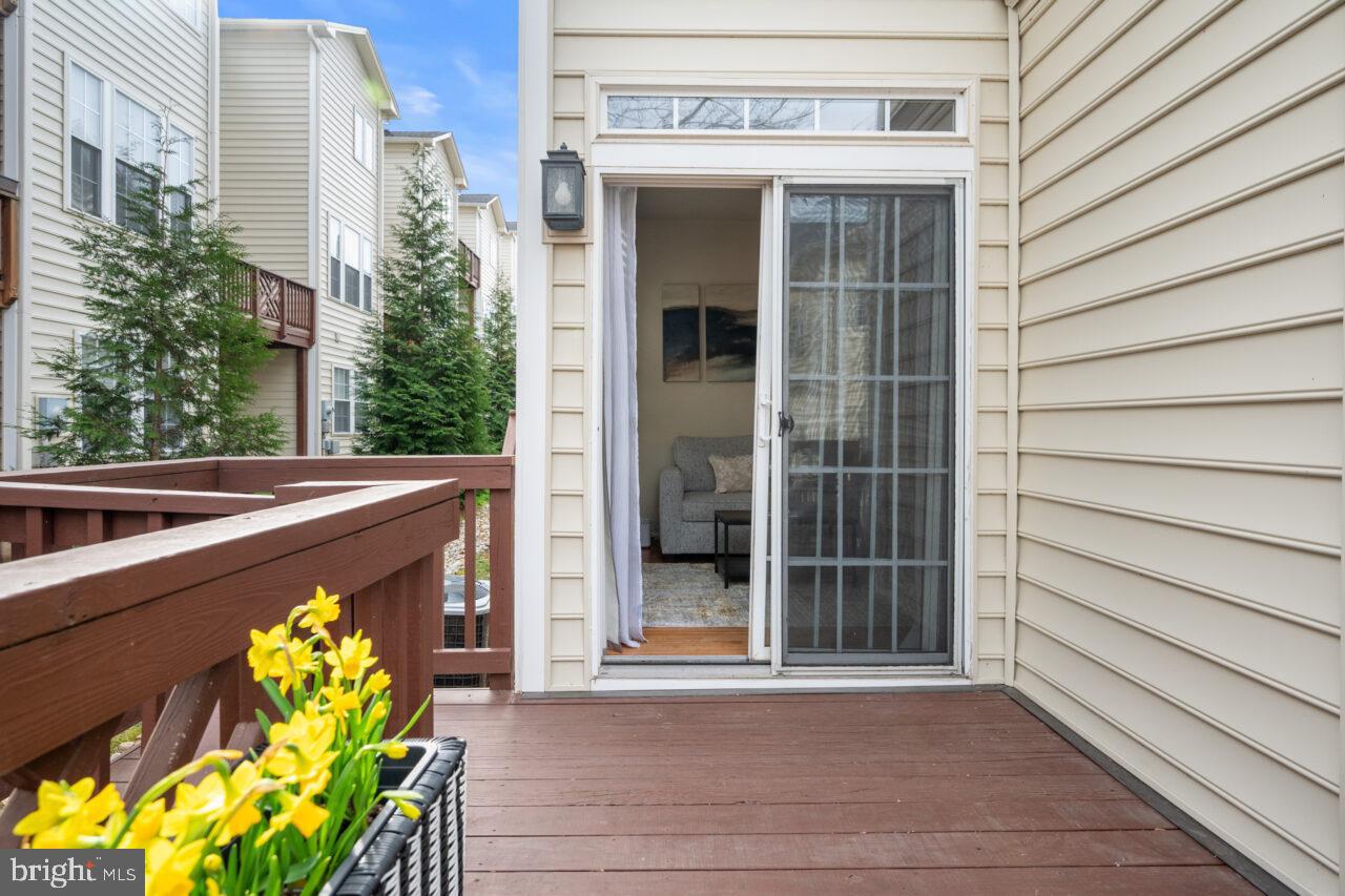 47799 Scotsborough Square Sterling, VA 20165 - Photo 22 of 53 a view of a door and chair front of house