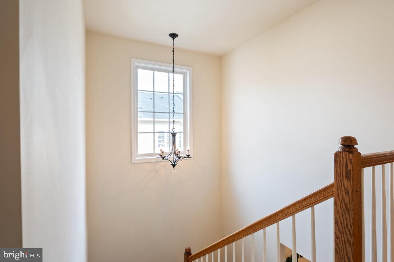 47799 Scotsborough Square Sterling, VA 20165 - Photo 25 of 53 a view of a hallway with a window