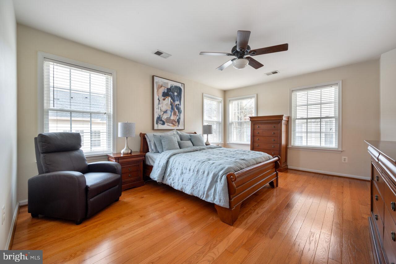 47799 Scotsborough Square Sterling, VA 20165 - Photo 26 of 53 a bedroom with a bed and a couch