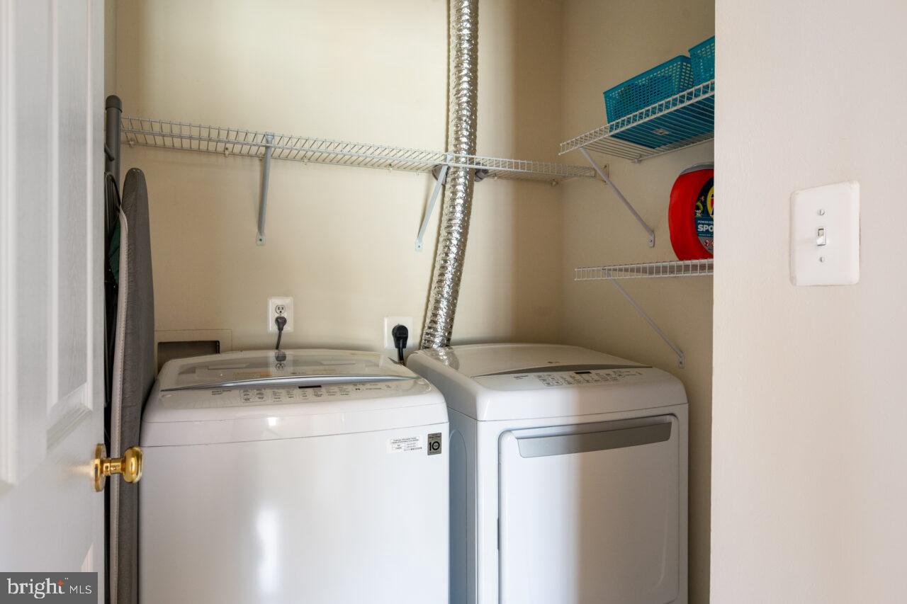 47799 Scotsborough Square Sterling, VA 20165 - Photo 35 of 53 a utility room with dryer and washer