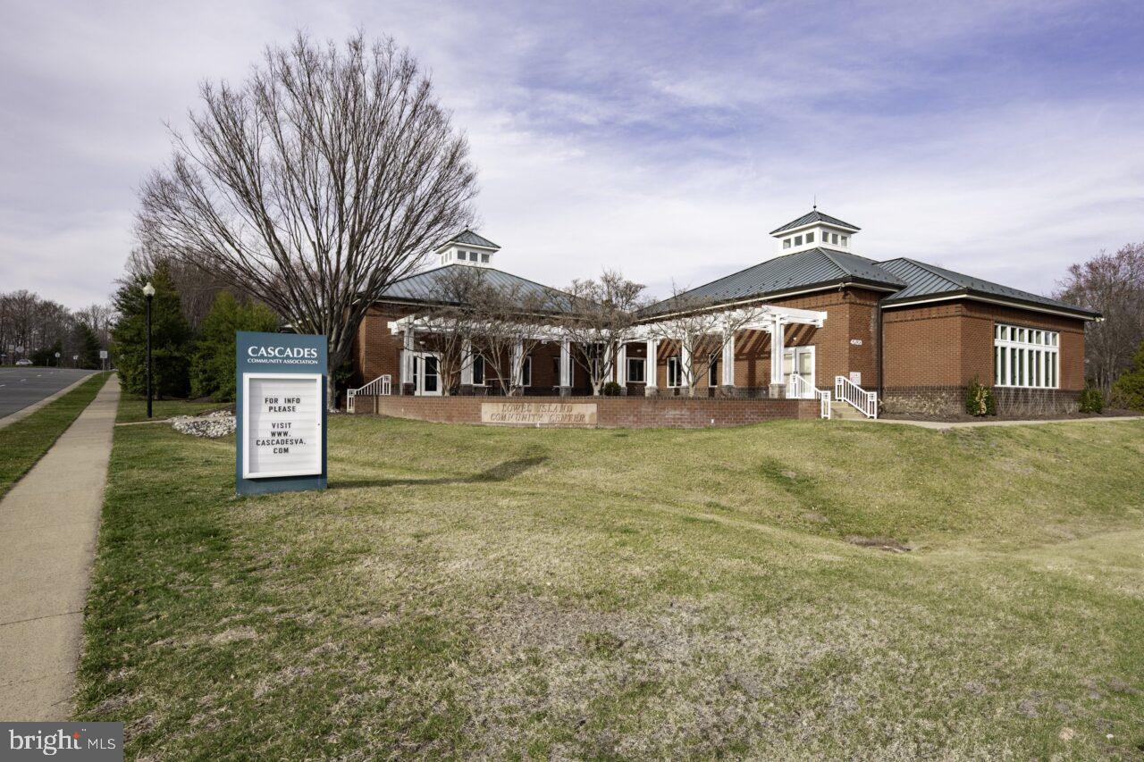 47799 Scotsborough Square Sterling, VA 20165 - Photo 47 of 53 a front view of a house with a yard