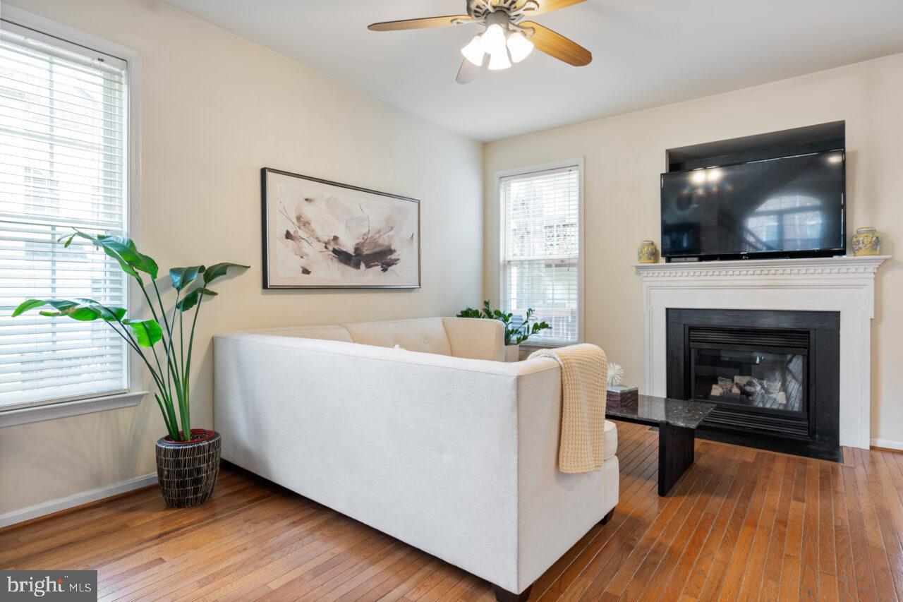 47799 Scotsborough Square Sterling, VA 20165 - Photo 9 of 53 a living room with furniture and a fireplace