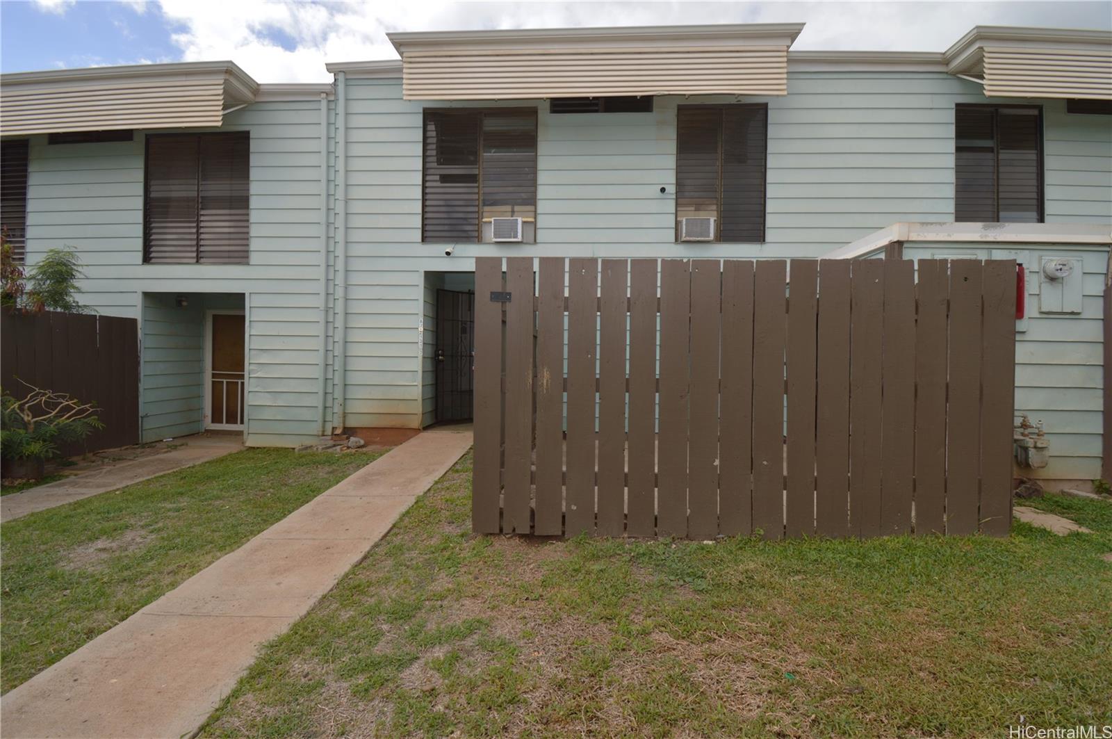87-21317 Helelua Place, Unit 7 Waianae, HI 96792 - Photo 1 of 21 a view of a backyard of the house