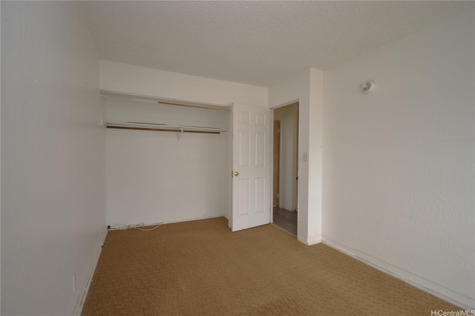 87-21317 Helelua Place, Unit 7 Waianae, HI 96792 - Photo 14 of 21 a view of an empty room