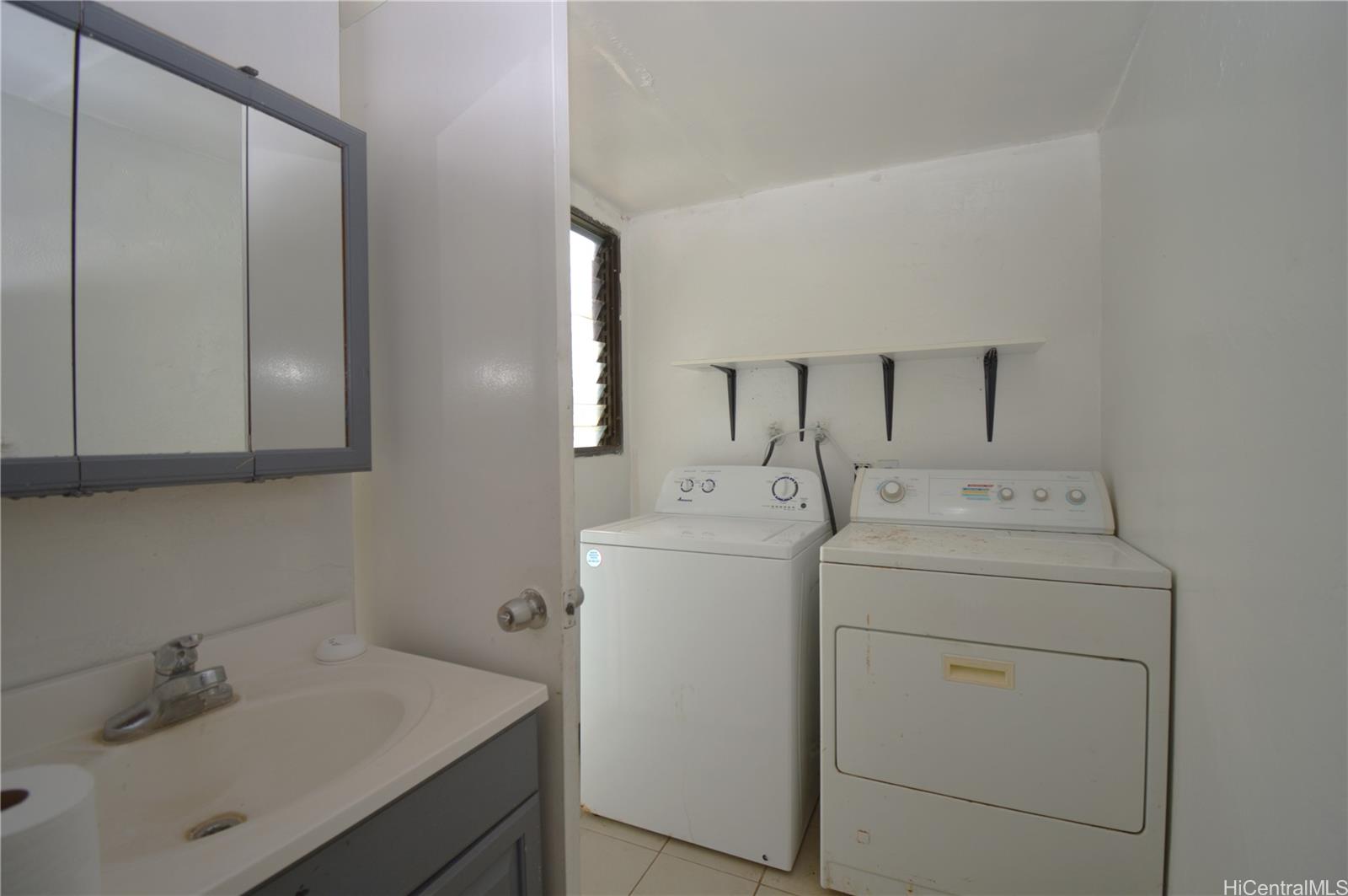 87-21317 Helelua Place, Unit 7 Waianae, HI 96792 - Photo 15 of 21 a utility room with dryer and washer