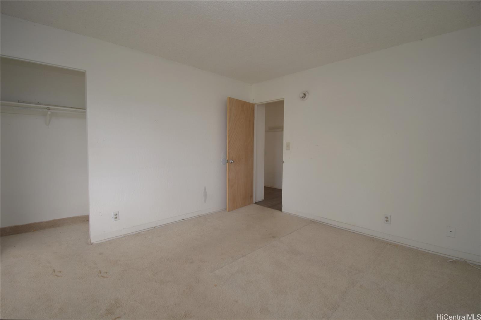 87-21317 Helelua Place, Unit 7 Waianae, HI 96792 - Photo 19 of 21 a view of an empty room