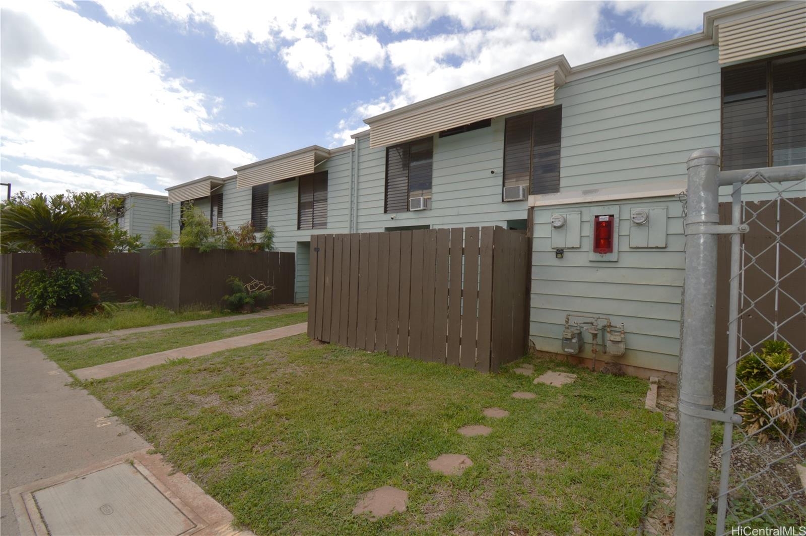 87-21317 Helelua Place, Unit 7 Waianae, HI 96792 - Photo 3 of 21 a backyard of a house